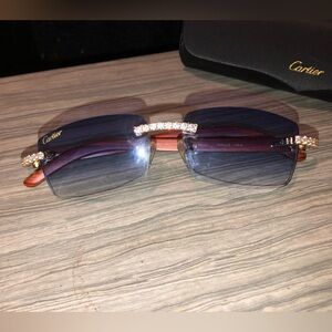 Cartier redwood frames with handset VVS diamonds